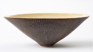 *Dame Lucie Rie DBE [1902-1995] a white stoneware bowl,