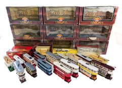 A collection of mainly Corgi buses and trams.