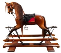 A Stevenson Brothers carved and painted rocking horse 'Mario'.