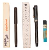 A boxed Parker fountain pen.