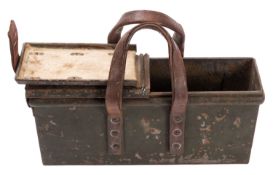 A WWI Vickers machine gun ammunition case with brown leather handles and strap,