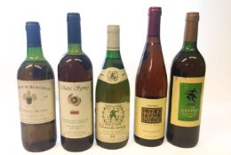Five bottles of 1990s wine.