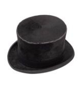 A black top hat with white leather sweatband. 52cm circumference, within fitter leather hat box.