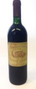 A bottle of Chateau Margeaux 1990. Fill level to neck, 75cl, 12.5% vol.