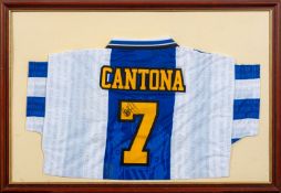 An Eric Cantona signed shirt.