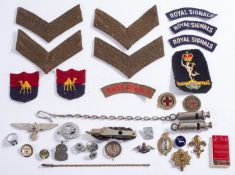 A collection of various cap and cloth and other badges, including Royal signal corps,
