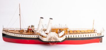 A scale model of the paddle steamer 'Devonia', rigged masts planked deck, lifeboats and davits,