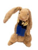 Farnell A blonde plush 'Wilfred' rabbit, with elongated a ears glass eyes,