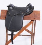 A Throwgood Club saddle in black.