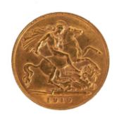 A 1908 Edward VII half sovereign coin.