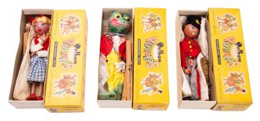 Three Pelham Puppets. Including Dutch Girl, Frog and Fritzi, all boxed.