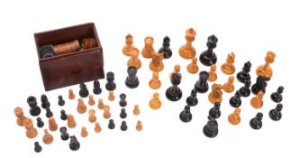 A Staunton pattern boxwood and ebony chess set, height of white king 9cm,