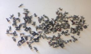 A collection of cast metal Napoleonic era model soldiers.