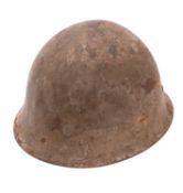A WWII Japanese Imperial Army type 90 steel helmet. With leather lining and canvas strap.