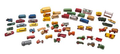 A collection of Lesney diecast vehicles, including buses, vans and tractors etc, all unboxed.