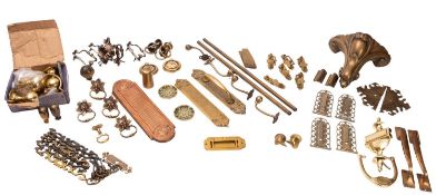 A box of assorted brass, copper and other metal door and drawer furniture,