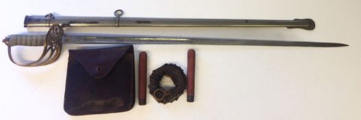 A George V officer's sword in scabbard.