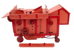 A scratch built model of a Channell & Son threshing machine.