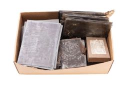A collection of early 20th Century glass negatives.