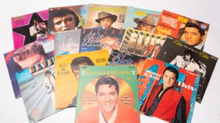Fifteen LP records by Elvis Presley including Flaming Star, Girls Girls Girls, Elvis Country,