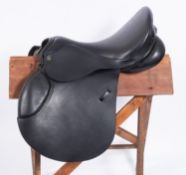 An Ideal 17.5 inch black leather jumping saddle.