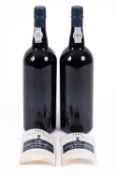 Two bottles of Smith Woodhouse 1994 vintage port. Both labels loose but present, 75cl, 20% vol,