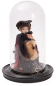 A Victorian wax head peddler doll.