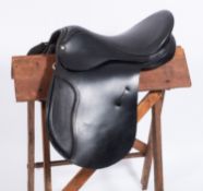 A Tack & Country Hilton black leather 17.5 inch saddle.