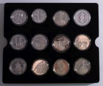 The Golden Jubilee £5 silver coins. With others, cased.