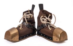 A pair of 20th Century brass and canvas diving boots, maker Desco of Milwaukee.