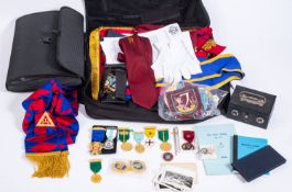 A collection of gilt and other Masonic jewels and regalia, including aprons and neck sashes,