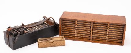 An early 20th century oak microscope slide case,