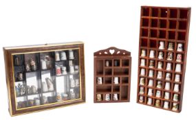 A large collection of porcelain and other thimbles, various makers including Royal Doulton,