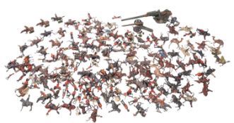 A collection of early 20th Century W Britain cast model soldiers.
