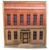 A late Victorian dolls house in the style of a Georgian town house.