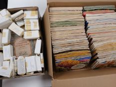 Two boxes of tea card sets in albums,