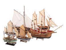 A group of ten various ship models ,