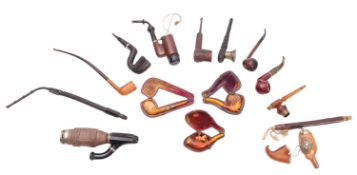 A white metal mounted walnut pipe.