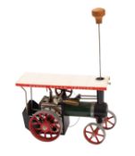 A Mamod live steam tractor. Complete with burner pan, unboxed.