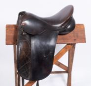 An Albion 17 inch black leather dressage saddle.