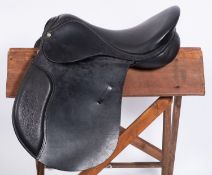 A Tack & Country Hilton black leather 17.5 inch saddle.