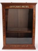 A Victorian mahogany and bone inlaid wall cabinet.