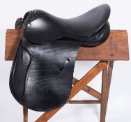 A Tack & Country Hilton black leather 17.5 inch saddle.