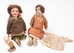 Two early 20th Century bisque head dolls.