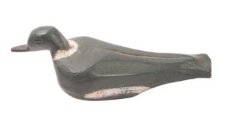 A carved wooden decoy pigeon, 37cm long.