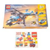 A Lego Creator 3 in 1 set. Together with a Lego set no.