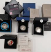 Four boxed Silver Proof £5 coins.