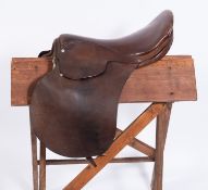 A Barnsby 16.5 inch Havana brown leather exercise saddle.