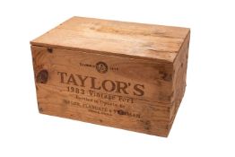A sealed case of 12 Taylors 1983 vintage Port.