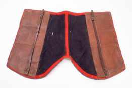 A jockeys Numnah together with three pairs of leather riding boots. One with trees.